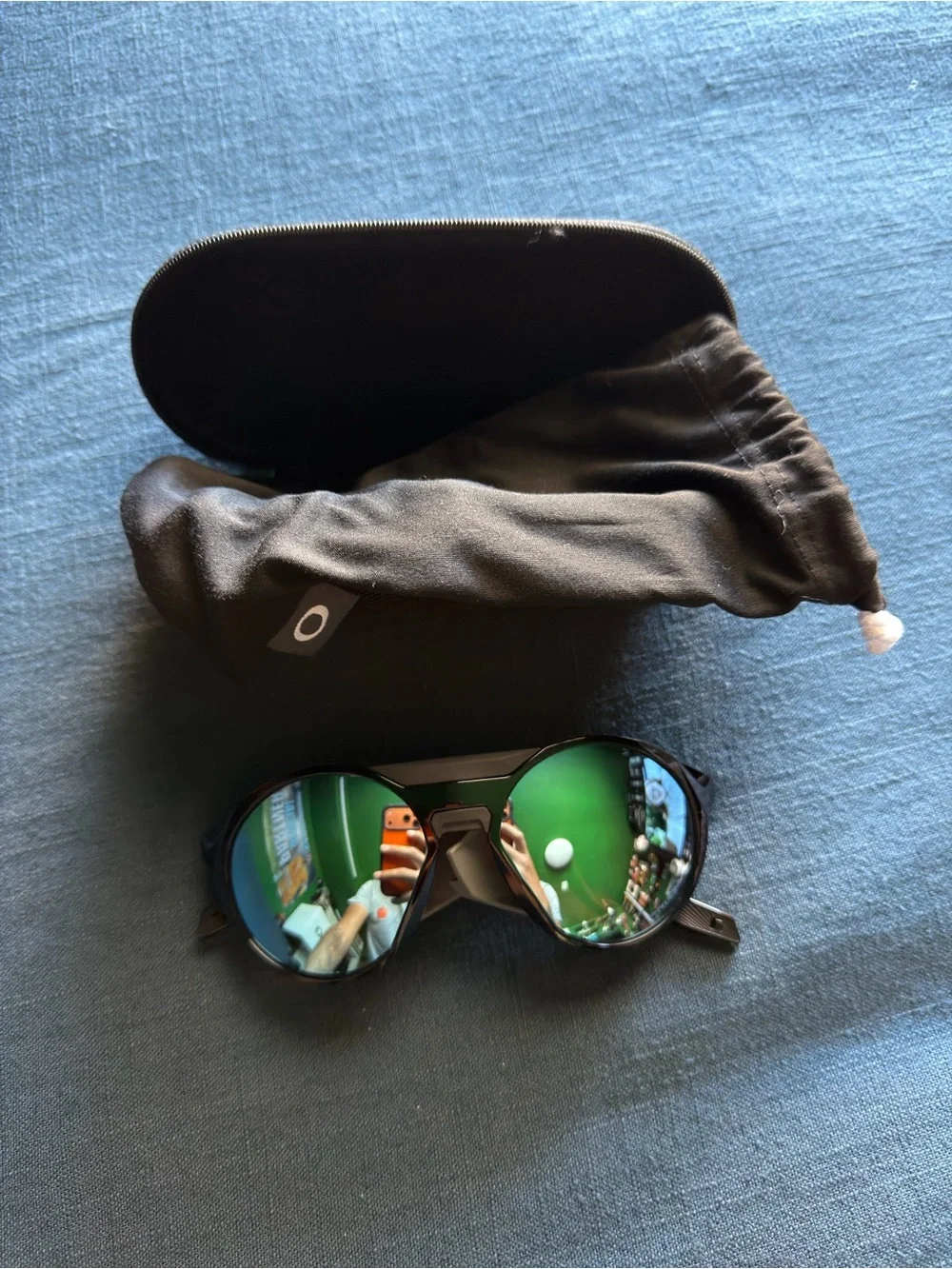 Oakley Clifden Black Frame Sunglasses with Red-Blue Mirrored Lenses